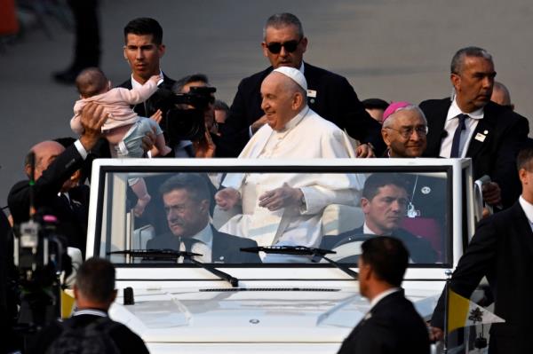 Tens of thousands greet pope at Portugal’s famed Fatima shrine